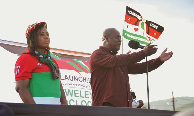 President Mahama addressing a rally at Dodowa. With him is Linda Akweley Ocloo, the parliamentary candidate for the Shai-Osudoku Constituency.  Picture: EBOW HANSON
